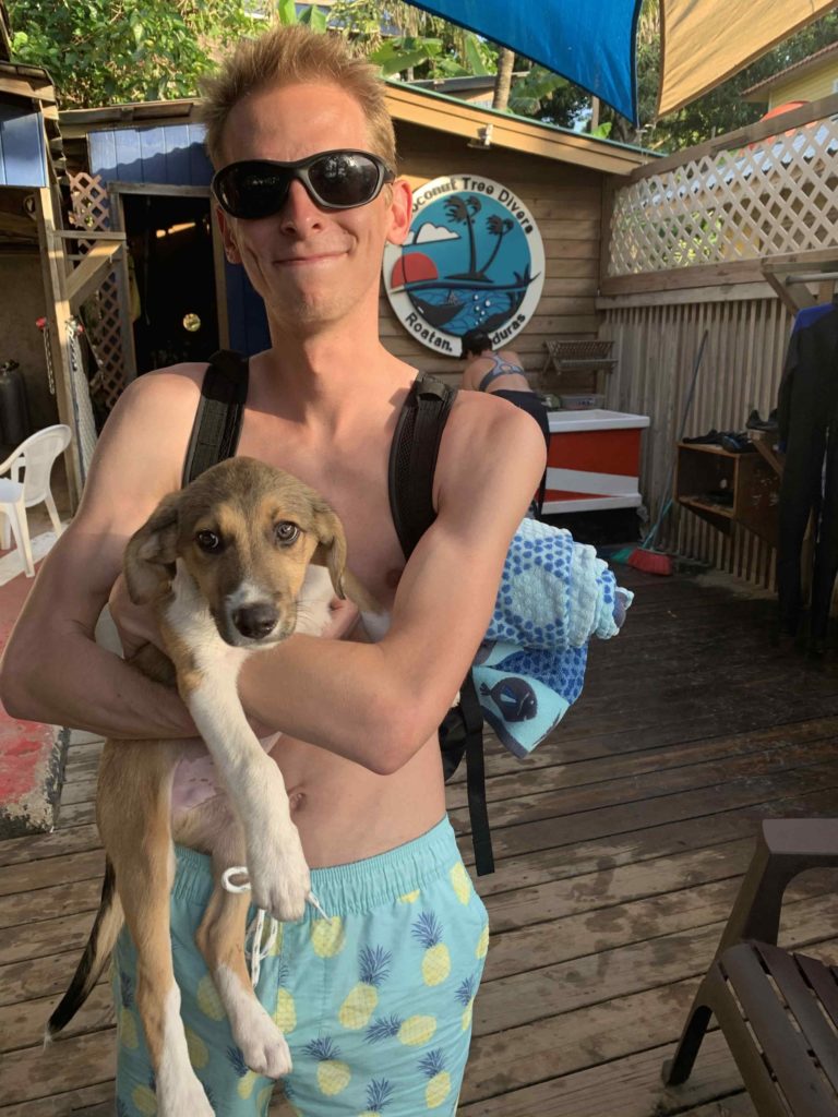 Scuba Diving in Roatan at Coconut Tree Divers with my new puppy friend!