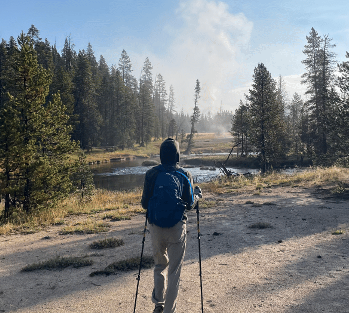 Backpacking through Yellowstone National Park with small day pack