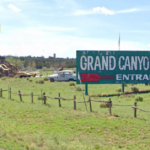 Entrance sign to the grand canyon caverns inn