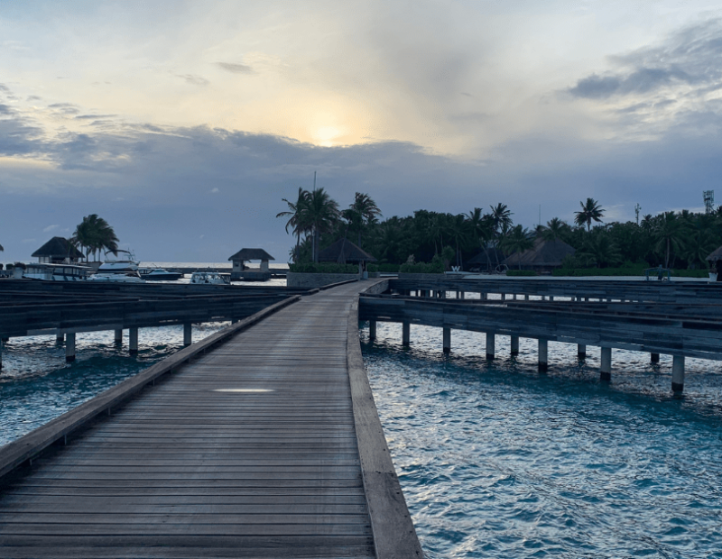W Maldives jetty from overwater bungalows to beach.
