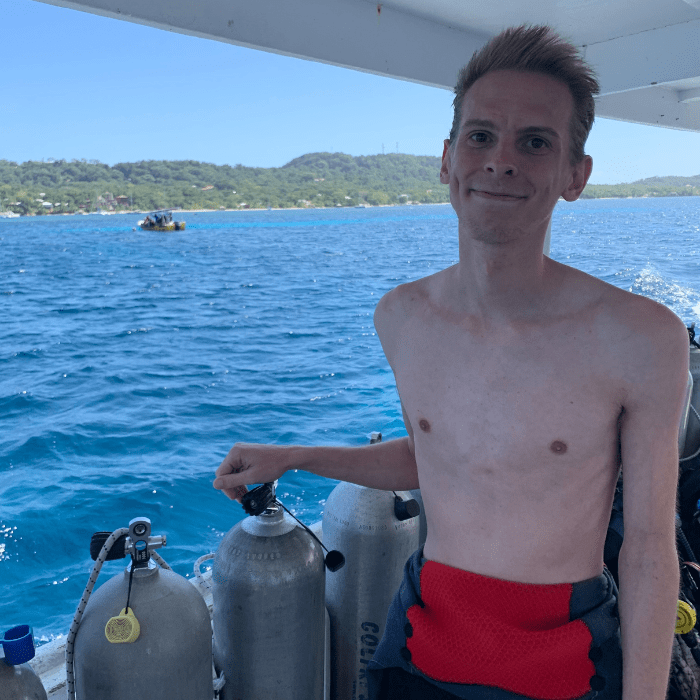 Man on scuba boat