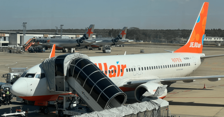 Jeju Air plane at the airport terminal