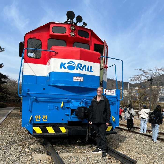 Myself standing in front of a Korail train that is no longer active.