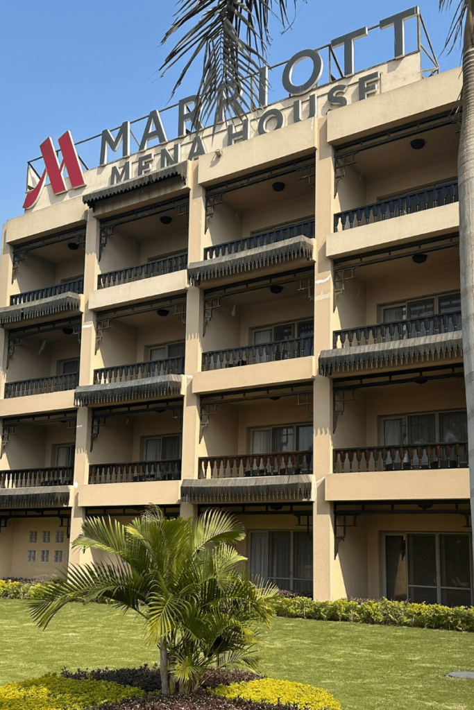 Marriott sign on building with green lawn in front
